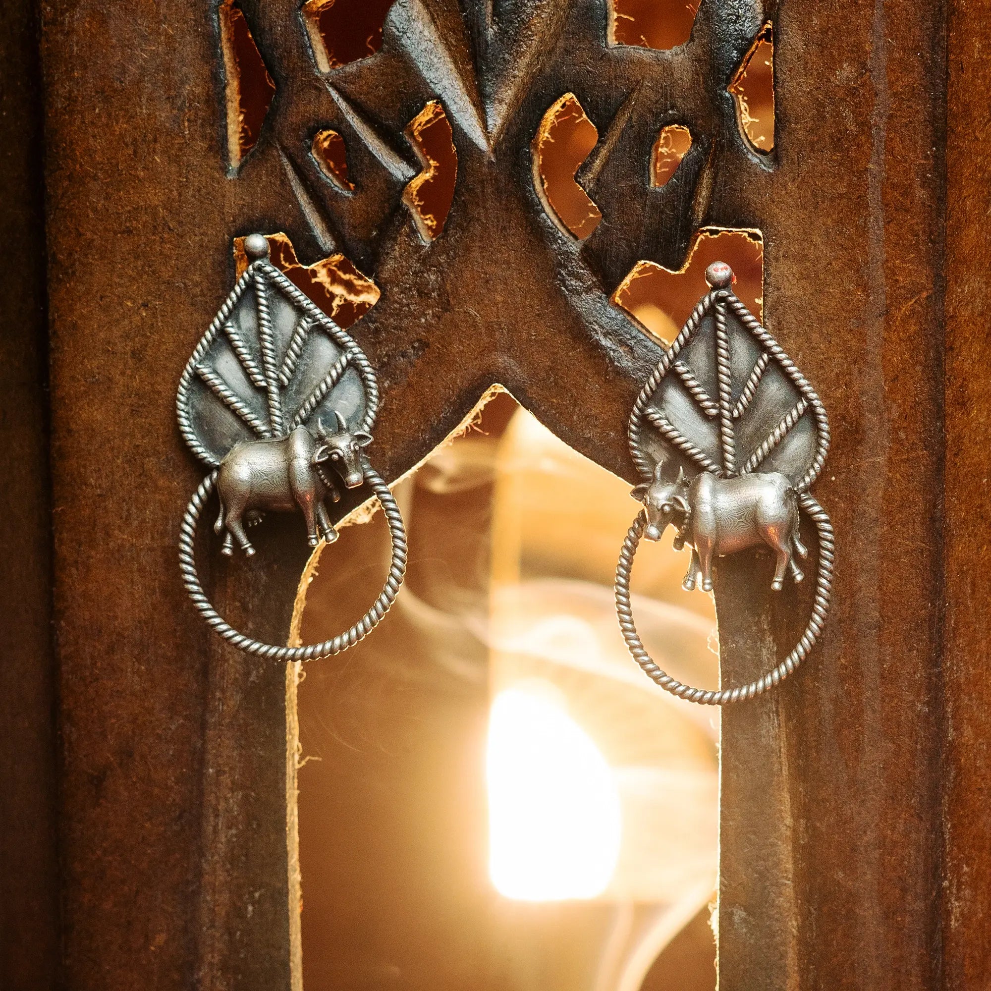 Handmade Silver Cow Earrings with Leaf Design