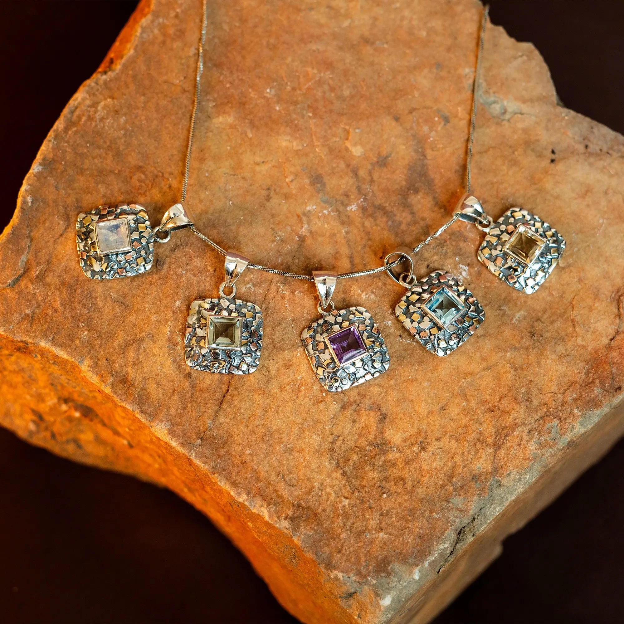 Hand-Forged Silver Pendant with Faceted Natural Stone and Three-Tone Plating