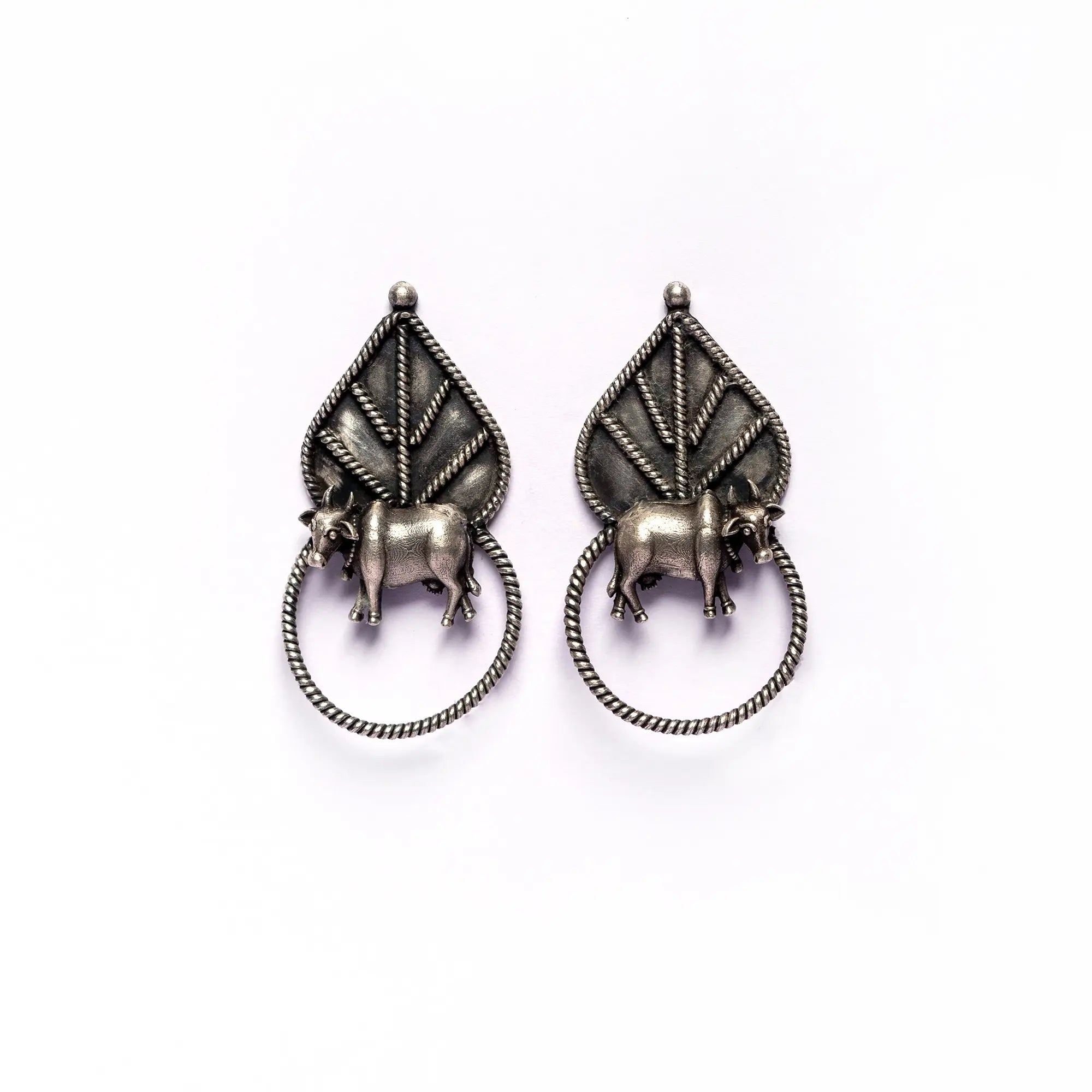 Handmade Silver Cow Earrings with Leaf Design