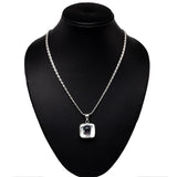 Hand-Forged Silver Pendant with Faceted Natural Stone and Three-Tone Plating